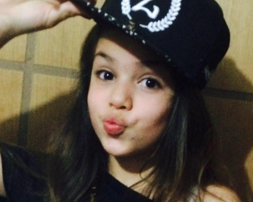 Melody também diz que vai cantar com Mariah Carey no Brasil (Reprod./Facebook)